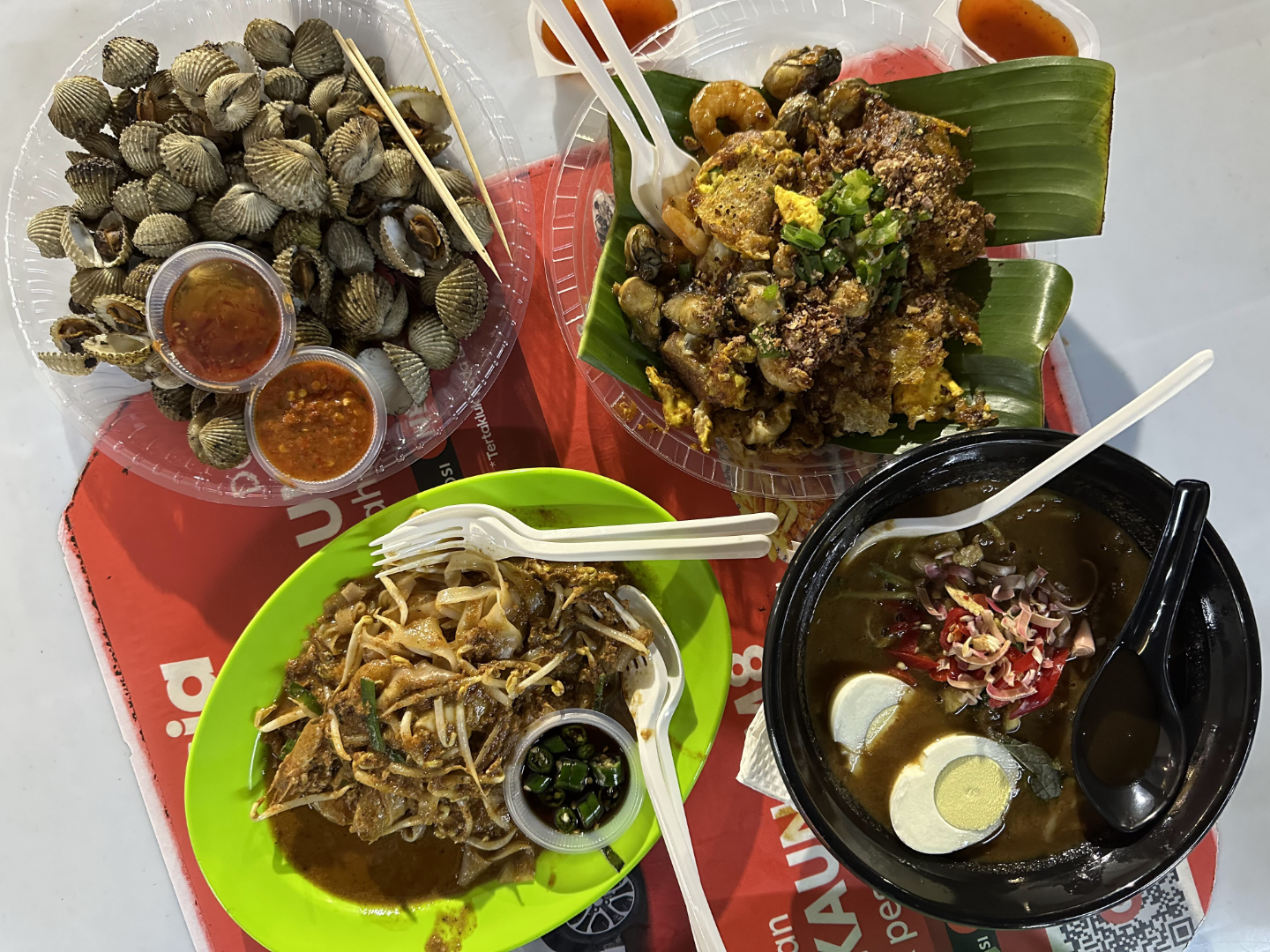 Blood Cockles, Fried Oyster Omelette, Char Kuey Teow, and Assam Laksa